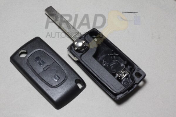 S-0260 Peugeot 2-knops klapsleutel behuizing met batterij achterkant en sleutelbaard zonder groef.
