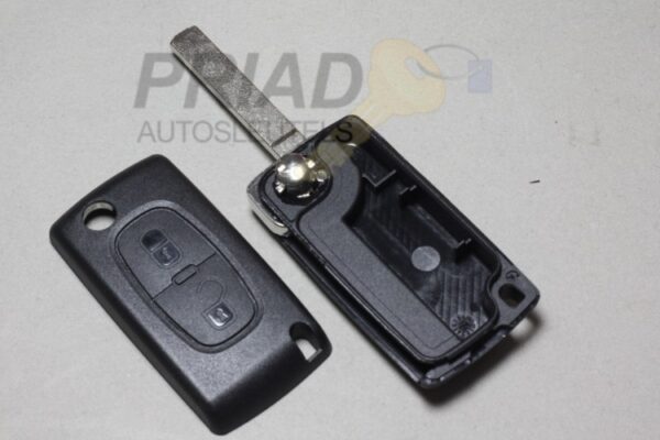S-0262 Peugeot 2-knops klapsleutel behuizing met batterij op de printplaat en sleutelbaard zonder groef.