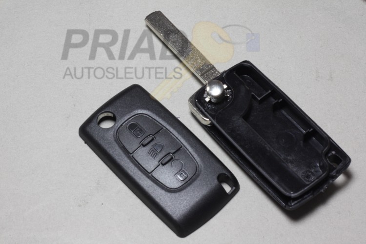 Citroen 3-knops klapsleutel met "lamp" knop op de middelste knop. Batterij printplaat met groef